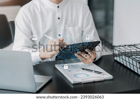 Person using smartphone, tablet  with SDK icon on virtual screen. SDK Software development kit programming language technology concept in office.