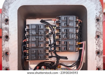Circuit breaker controlling panel of the electric junction box for industrial use. Industrial and safety equipment object photo, selective focus.