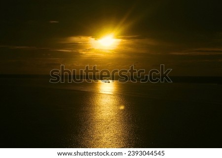 nature photo of sunset reflection on the sea taken from cruise ship in Malacca strait