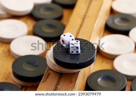 game of backgammon.Old wooden backgammon board
