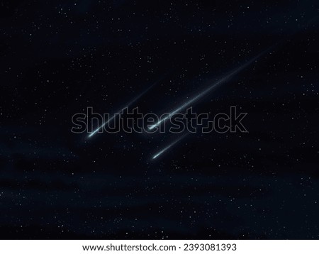 Meteor trails on a starry night. Beautiful meteor storm. Meteorites glow in the atmosphere.