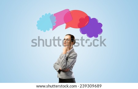 Young thoughtful businesswoman and colorful speech bubbles above head
