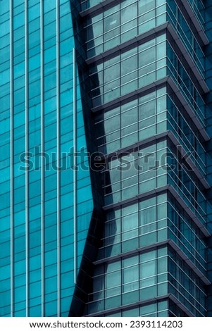 Picture of building geometric blue glass facade as bkacground