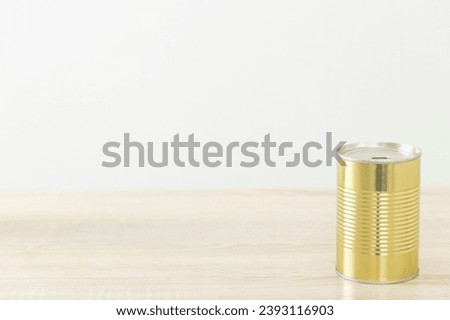 Canned food on the desk.