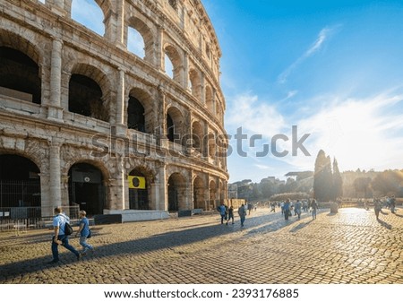 World famous Coliseum under a blue sky. Rome, Italy Royalty-Free Stock Photo #2393176885