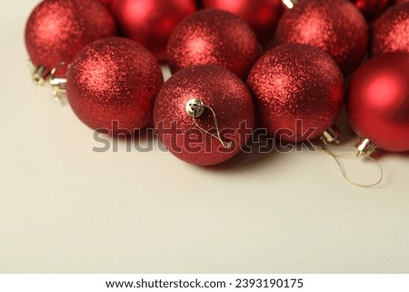 Red christmas balls on white background. Top view, flat lay. The year 2024 is coming.