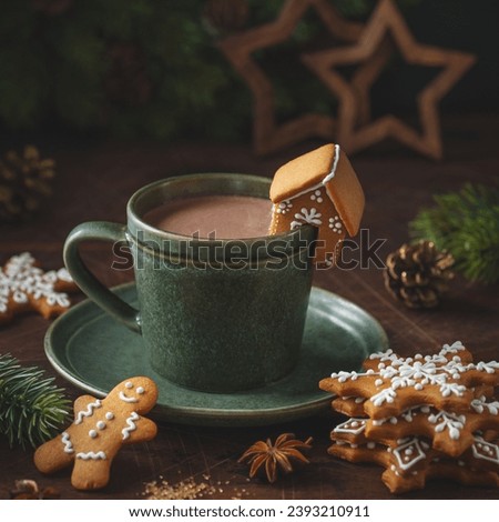 Cup of hot chocolate with gingerbread cookies. Christmas and New Year sweet drink and food holiday concept.