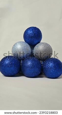 Christmas ornaments, silver and blue, with glitter and shiny