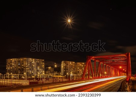 road bridge and modern residential skyscrapers in Gdansk Letnica at night