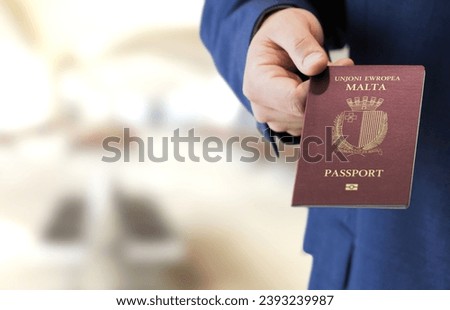 Malta passport, raise hand when boarding to hand over the passport