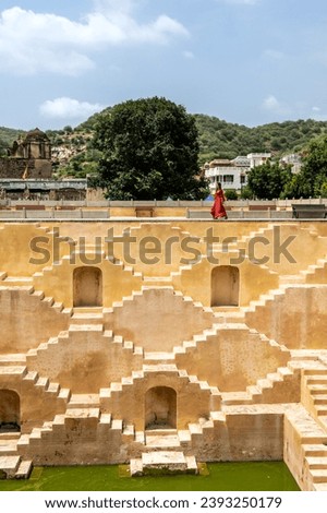 Women in the stairs of Panna Meena ka Kund in Amber, near Jaipur, Rajasthan, India Royalty-Free Stock Photo #2393250179