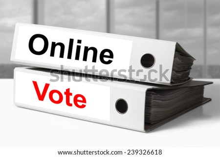 stack of white office binder online vote