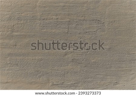 Gray old plaster on the wall. Decorative plaster structure background.