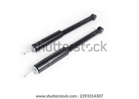 Photo of a pair of car shock absorbers