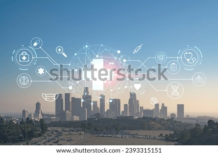 Skyline panorama of Los Angeles downtown at sunset, California, USA. Skyscrapers of LA city. Hologram healthcare digital medicine icons. The concept of treatment from disease, Threat of pandemic
