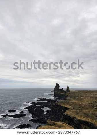 Iceland's surreal beauty captured in an image: a stunning panorama of otherworldly landscapes. Majestic waterfalls cascade, glaciers gleam, and geothermal wonders paint a picture of raw.