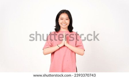 Smiling and doing namaste greeting Of Beautiful Asian Woman Isolated On White Background Royalty-Free Stock Photo #2393370743
