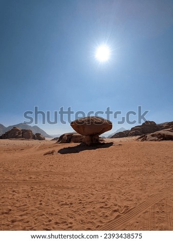 Wadi Rum Desert, Jordan.Bedouin man laying in sand Jabal Al Qattar mountain.Where some movies where shot,beautiful panorama scenic landscape view,beautiful sand dunes