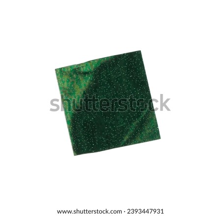 Piece of green confetti isolated on white