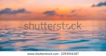 Stunning scenic view of endless ocean water surface with horizon line under defocus bright colorful sunset sky in evening time. Dream inspirational nature pattern, seascape skyline tranquil background Royalty-Free Stock Photo #2393456187