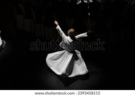 Sufi Whirling Dervishes Ceremony in the Ataturk Cultural Center (Ataturk Kultur Merkezi), Taksim Square Beyoglu, Istanbul Turkiye (Turkey) Royalty-Free Stock Photo #2393458115