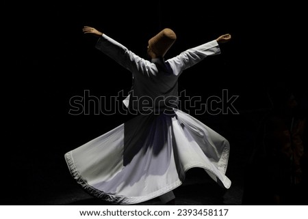 Sufi Whirling Dervishes Ceremony in the Ataturk Cultural Center (Ataturk Kultur Merkezi), Taksim Square Beyoglu, Istanbul Turkiye (Turkey) Royalty-Free Stock Photo #2393458117