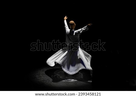 Sufi Whirling Dervishes Ceremony in the Ataturk Cultural Center (Ataturk Kultur Merkezi), Taksim Square Beyoglu, Istanbul Turkiye (Turkey) Royalty-Free Stock Photo #2393458121