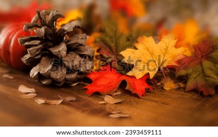 Autumn leaves on a brown table, thanksgiving concept Royalty-Free Stock Photo #2393459111