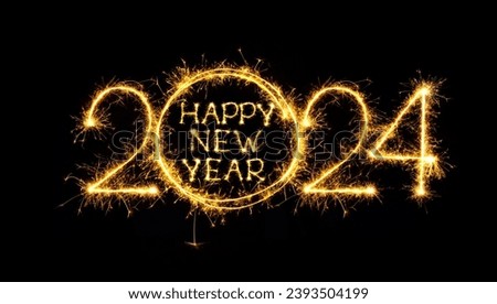 Happy New Year 2024. Creative text Happy New Year 2024 written burning sparklers on black background. Design element. Beautiful sparkling overlay template for holiday greeting card and flyer