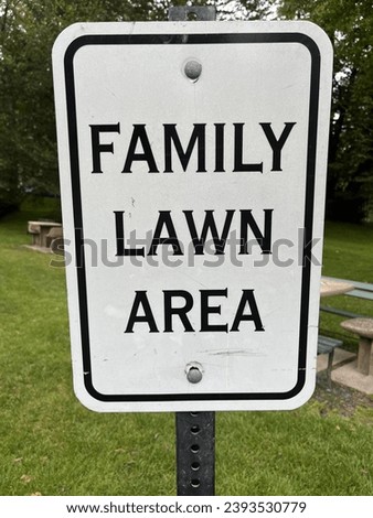 A sign that says family lawn area.