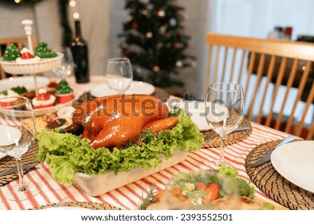 Christmas and roast food on dining table