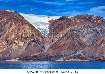 Tidal glacier on Ellesmere Island in Canadian High Arctic Royalty-Free Stock Photo #2393577415