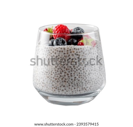 Healthy Chia Pudding in a Glass with Fresh Berries on White Background Royalty-Free Stock Photo #2393579415