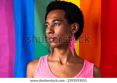 Fluid gender non binary hispanic  man posing in studio with fashionable clothing - concepts about LGBTQ, genderless and diversity