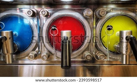 close up of primary color slushy machine Royalty-Free Stock Photo #2393598517