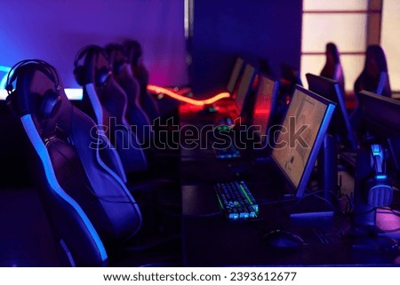 Background image of cybersports club interior with professional gaming equipment in row, copy space