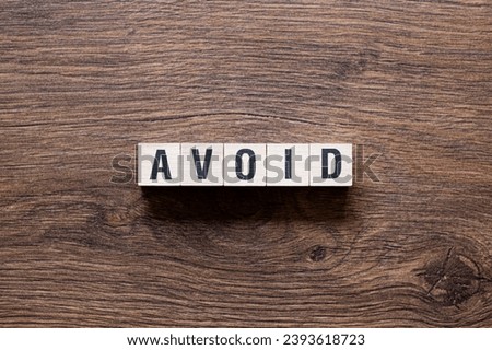 avoid - word concept on building blocks, text, letters