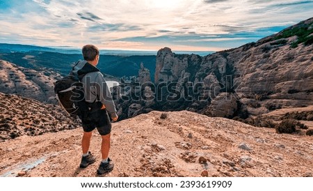 Alpine Ascent: A Trekker's Odyssey Scaling Boron Peak Amidst Huesca's Pyrenean Majesty, with the Serenity of Vadiello Reservoir Unveiling a Picturesque Tapestry in Aragon's Wilderness.

 Royalty-Free Stock Photo #2393619909