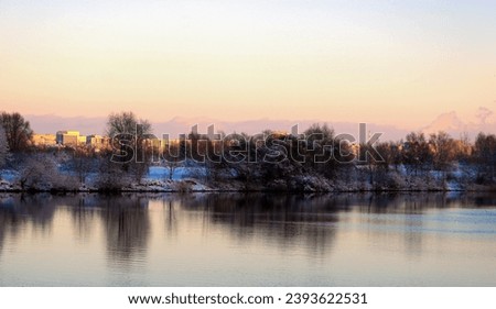 Beautiful winter on the river bank Royalty-Free Stock Photo #2393622531