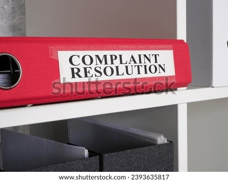 Folder with complaint resolution papers. Royalty-Free Stock Photo #2393635817