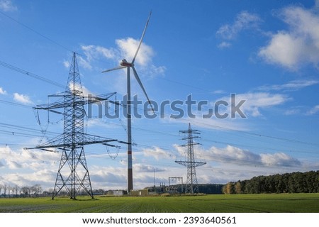 High-voltage line in cold, sunny weather Royalty-Free Stock Photo #2393640561