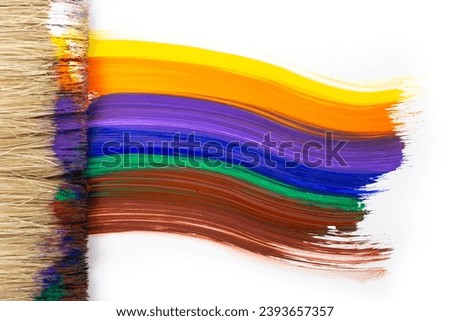 Rainbow colors in shape of a flag painted with a single brush stroke, isolated on white background