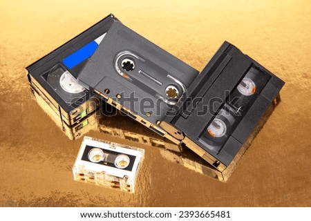 Audio cassette. device for working with voice and journalism. analog audio recording. Royalty-Free Stock Photo #2393665481
