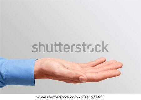 woman's blank empty hand holding object