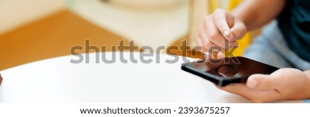 Close up woman hand pointing on smartphone 
