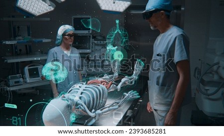 Male and female surgeons in AR headsets work in operating room using futuristic holographic display. 3D graphics of virtual human skeleton and organs. AI technology in medicine. Healthcare innovation.