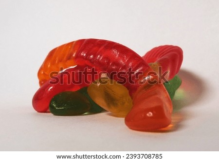 A picture of a few gummy worms