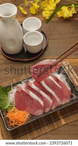 Japanese fresh yellowtail sashimi. Japanese sashimi and sake.