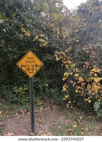 Funny sign caution sign in autumn