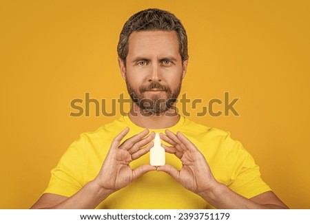 healthcare man with medicine on background. healthcare man with medicine in studio.
